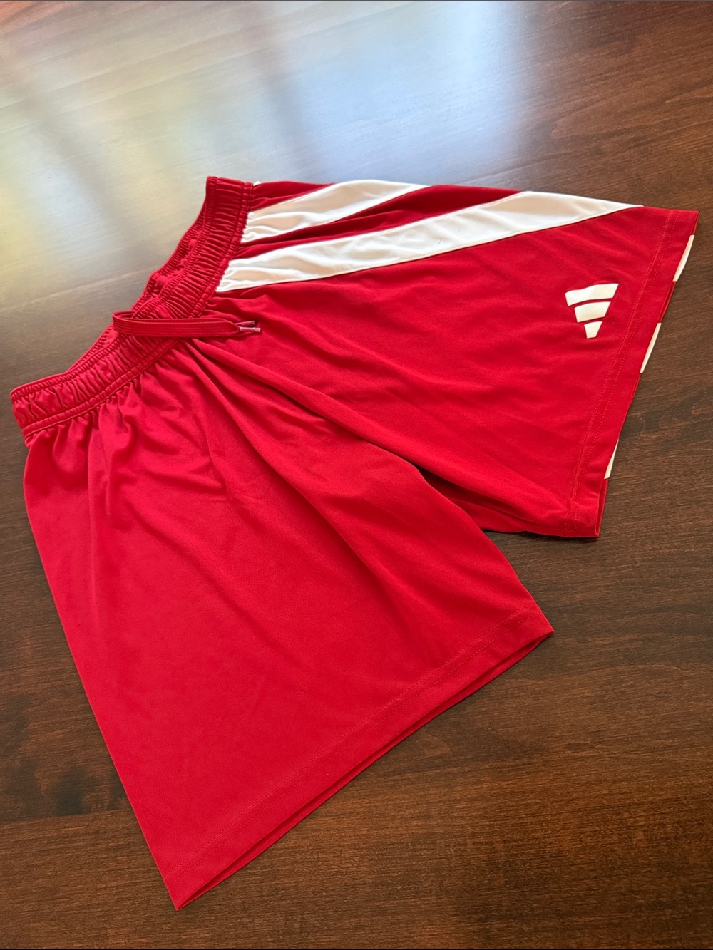 adidas Red Athletic Shorts with White Side Panels. Size S. Waist 24”plus stretch